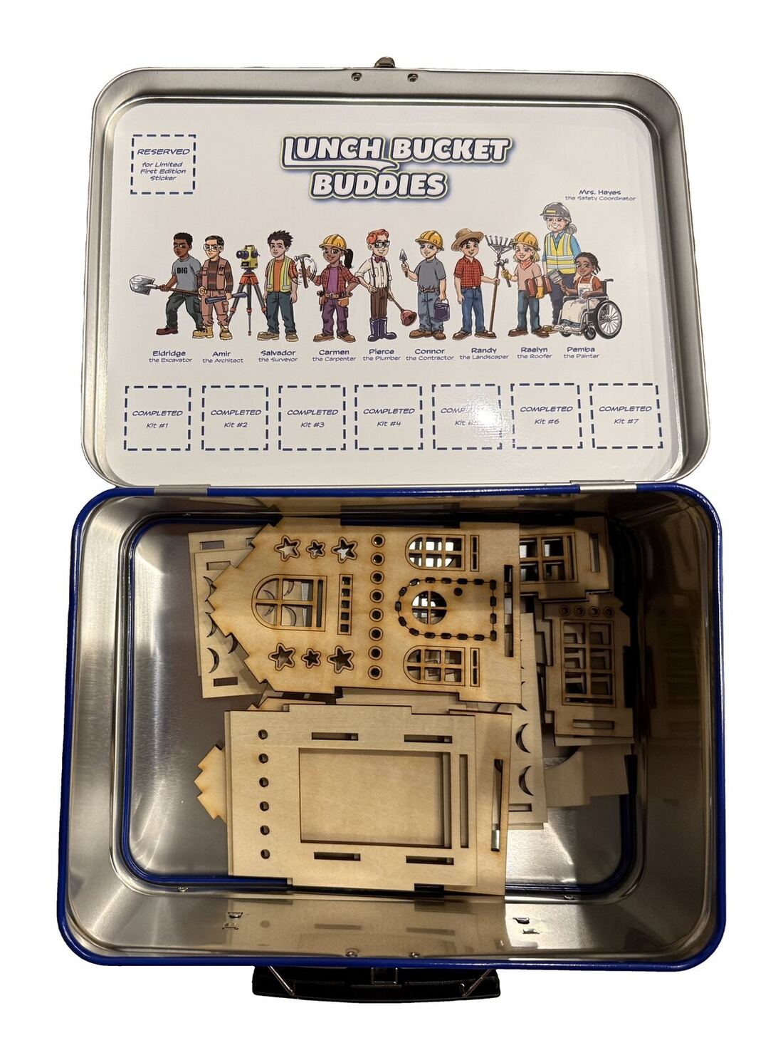 The open lunch bucket with the laser-cut balsa pieces packed inside.